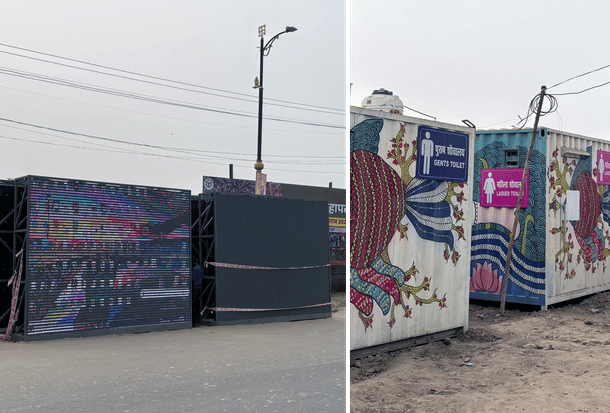 Large display screens, hoardings, public toilets, and food stalls line the way (Ankit Saxena/Swarajya)