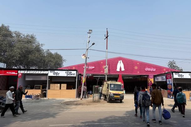 The parallel route through Triveni Road is lined up with larger food courts and corporate pavilions (Ankit Saxena/Swarajya)