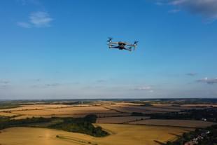 Drone surveying land (representative image)