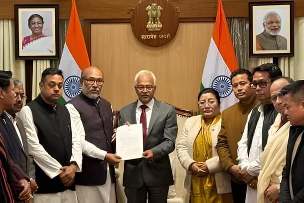 Manipur CM Biren Singh handing over his resignation to Governor Ajay Bhalla (centre, in suit)