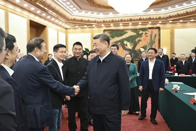 Chinese President Xi Jinping shakes hands with Huawei founder Ren Zhengfei at a symposium that brought together the country’s leading tech entrepreneurs on February 17. Photo: Xinhua