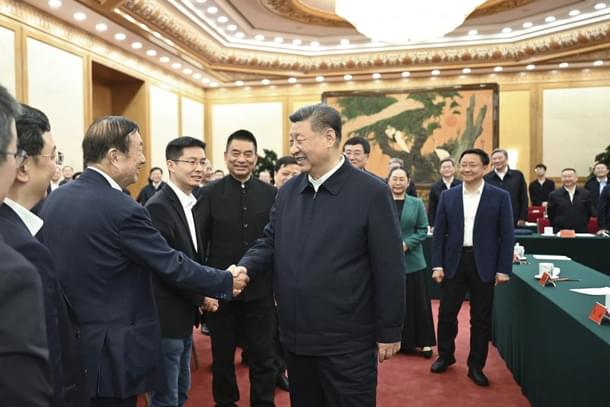 Chinese President Xi Jinping shakes hands with Huawei founder Ren Zhengfei at a symposium that brought together the country’s leading tech entrepreneurs on February 17. Photo: Xinhua