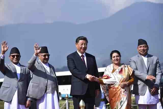 Chinese President Xi Jinping (centre) with Nepal's then President Bidya Devi Bhandar and Prime Minister Oli (to Jinping's right) and Vice president Nanda Bahadur Pun )To Bhandari's left)