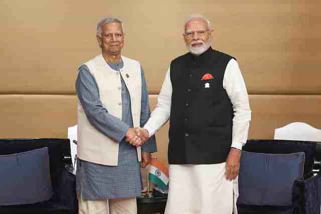 Prime Minister Modi with Mohammad Yunus on sidelines of BIMSTEC summit at Bangkok.