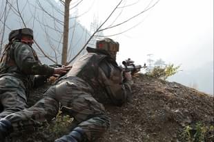 Indian soldiers take position on the border with Pakistan.  (ROUF BHAT/AFP/Getty Images)
