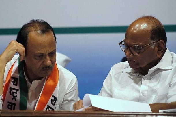 Sharad Pawar (R) and his nephew Ajit Pawar (L). (File Photo)