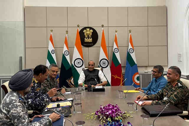 Defence Minister Rajnath Singh with top defence officials including the Tri-Services chiefs