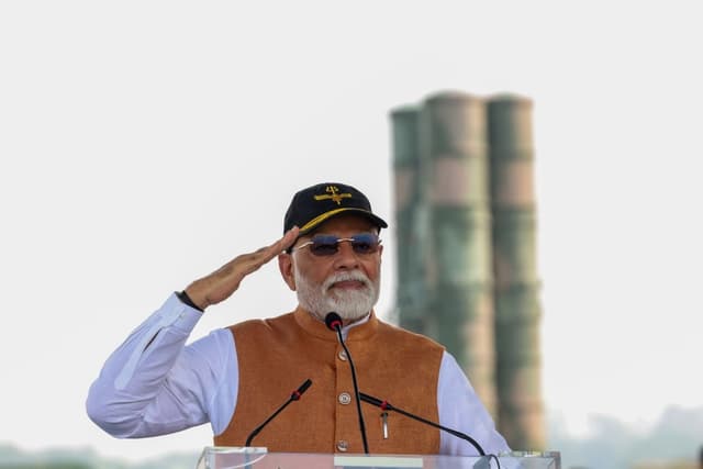 Prime Minister Modi at the IAF's Adampur Airbase after the success of Operation Sindoor with S-400 in the background.
