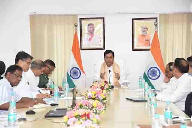 Sarbananda Sonowal taking a review meeting (PIB)