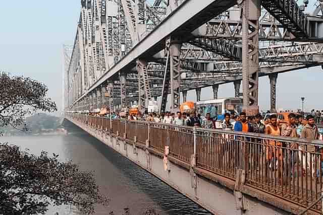 Howrah Bridge on the Hooghly River, Kolkata, India. (Photo by Bernard Gagnon)