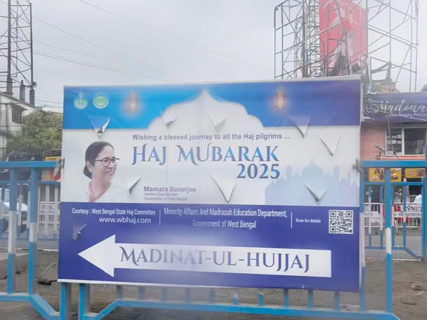 Hoardings near Kolkata airport featuring Mamata Banerjee’s face alongside Haj greetings