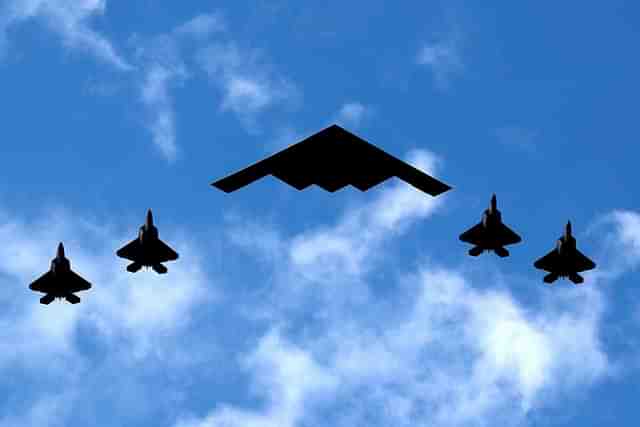 B-2 Stealth bomber with F-35s 