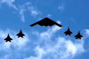 B-2 Stealth bomber with F-35s