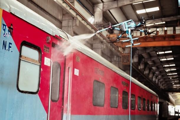 Train cleaning using drones