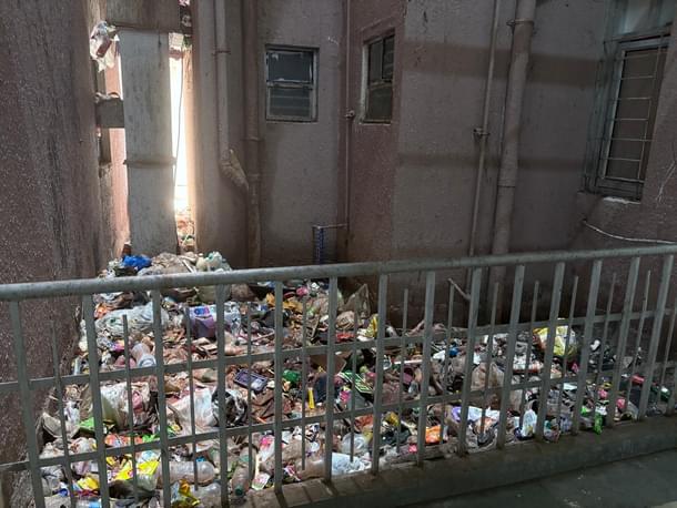 Waste dumped in open spaces within towers.