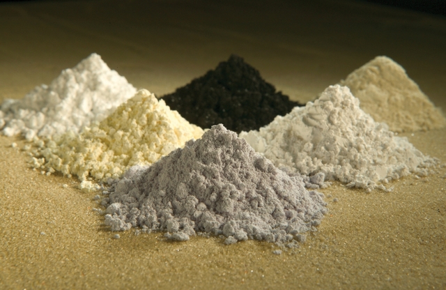 Rare earth oxides. Clockwise from top center: praseodymium, cerium, lanthanum, neodymium, samarium, and gadolinium. (Photo: Peggy Greb, US Department of Agriculture)