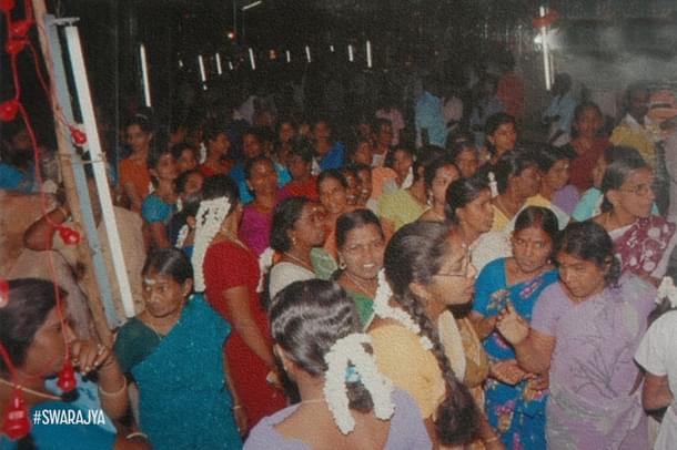 2008: Hindu women facing police action for taking the Goddess in a procession.