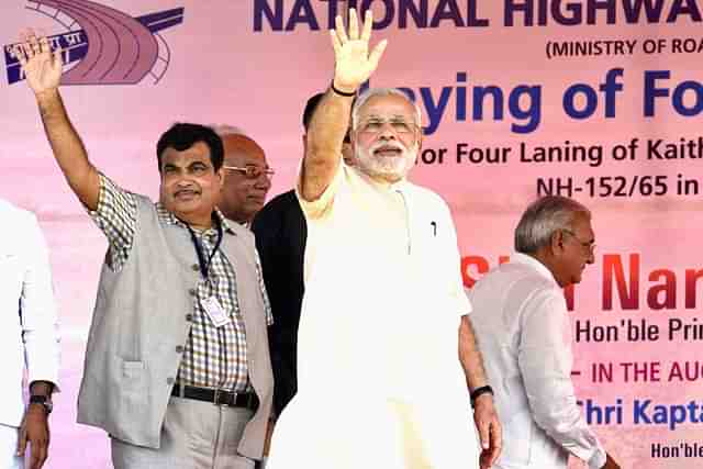 Prime Minster Narendra Modi with Union Minister of Road Transport and Highways, Nitin Gadkari. (Gurpreet Singh/Hindustan Times via Getty Images) 