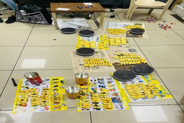 DRI officers at Mumbai Airport seized over 6 kg of cocaine hidden inside Oreo and chocolate boxes carried by a woman arriving from Doha. (Pic Via X)