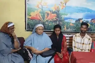 Two Catholic nuns, Preeti Marry and Vandana Francis, are escorted by police following their arrest on suspicion of coerced conversion and human trafficking. (Pic Via X)