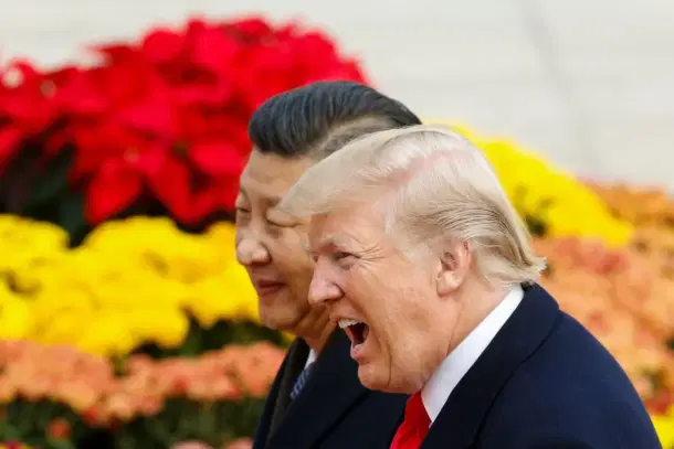 US President Donald Trump takes part in a welcoming ceremony with China’s President Xi Jinping. (Thomas Peter-Pool/Getty Images)