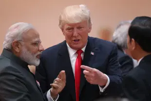 President Donald Trump chats with Prime Minister Narendra Modi on the second day of the G20 summit in Hamburg, Germany. (Sean Gallup/Getty Images)