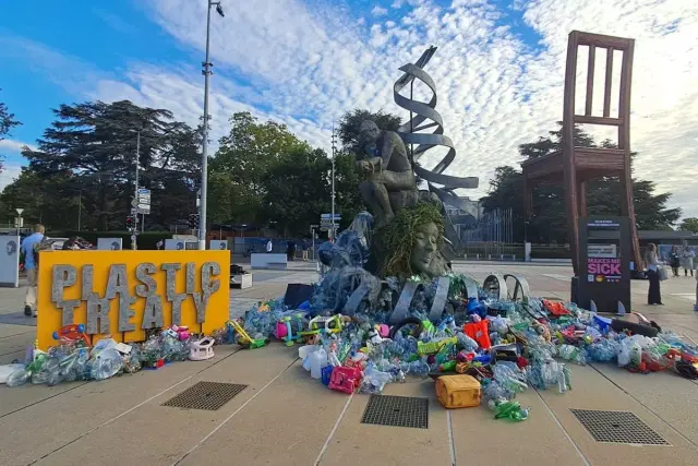 "The Thinker's Burden" depicts a world slowly drowning in plastics.