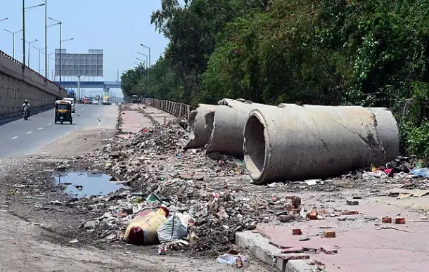 Sideways interrupted by open drains in Delhi.