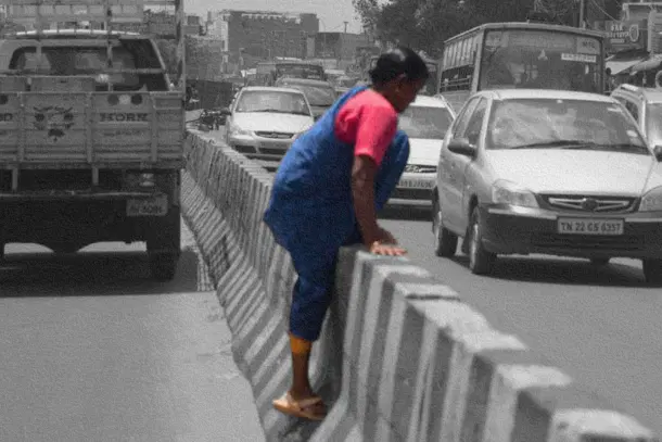Lack of sufficient or accessible pedestrians streets and zebra crossings force peopel to risk their lives on India's motor-centric roads every day. A scene near Koyembedu in Chennai. (The Hindu)