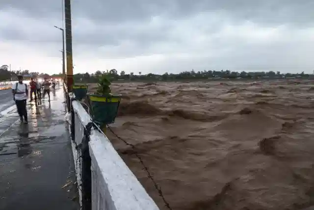 Portion of Madhopur Headworks barrage washed away as Tawi river swells following torrential rains in Jammu (X)