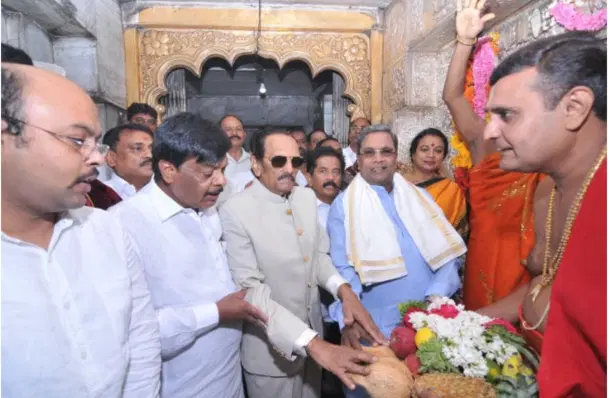 Nissar Ahmmed at a ceremony.