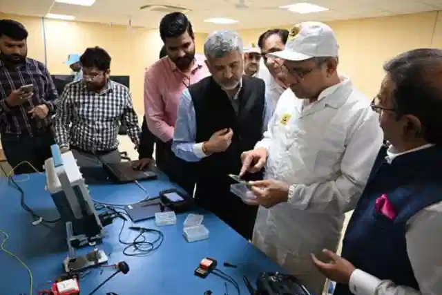 Union Minister Ashwini Vaishnaw at the tempered glass manufacturing plant in Noida