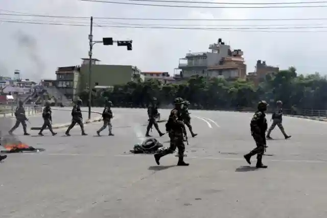 Police and paramilitary forces stand guard at Panitanki near the India-Nepal border in Darjeeling after violent protests forced Nepal PM KP Sharma Oli to resign. (X)