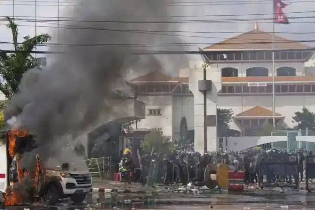 Nepal Parliament set on fire.