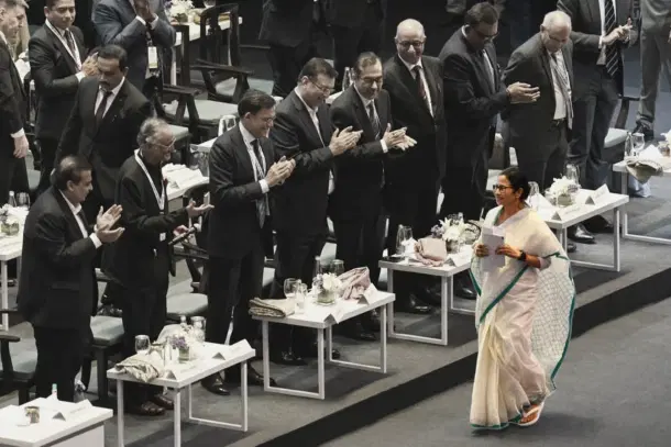 Chief Minister Mamata Banerjee being greeted by leading business tycoons at the Bengal Global Business Summit in Kolkata in February 2025 (Credit: Salil Bera)