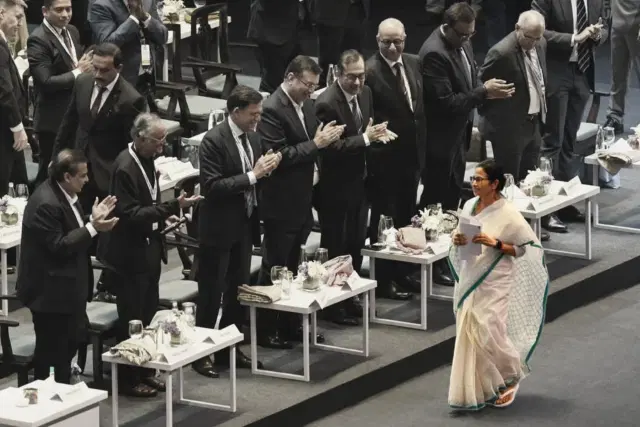 Chief Minister Mamata Banerjee being greeted by leading business tycoons at the Bengal Global Business Summit in Kolkata in February 2025 (Credit: Salil Bera)
