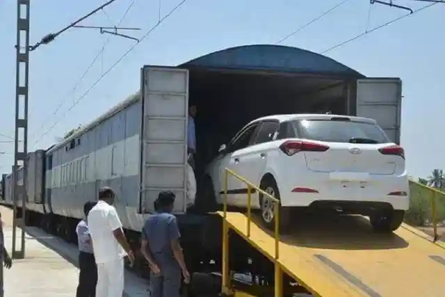 Cars being loaded on to a rake.