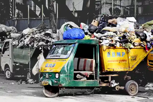 Garbage trucks filled with solid waste collected from homes at Koramangala in Bengaluru. (Credit: Sampath Kumar GP)
