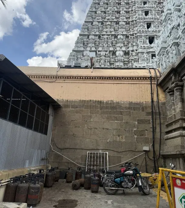 Gas cylinders kept dangerously close to the gopuram (TR Ramesh).