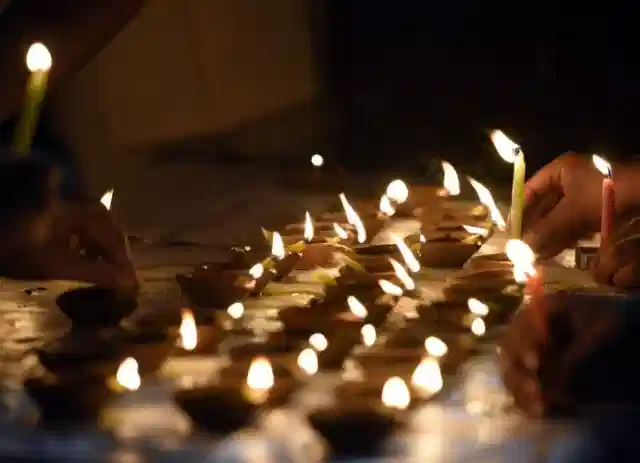 People light diyas on Diwali in New Delhi, India. (Sonu Mehta/Hindustan Times via GettyImages)&nbsp;