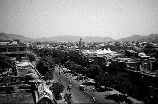 View from the upper storey of Hawa Mahal along the arrow straight bazaar, hills closing the horizon.