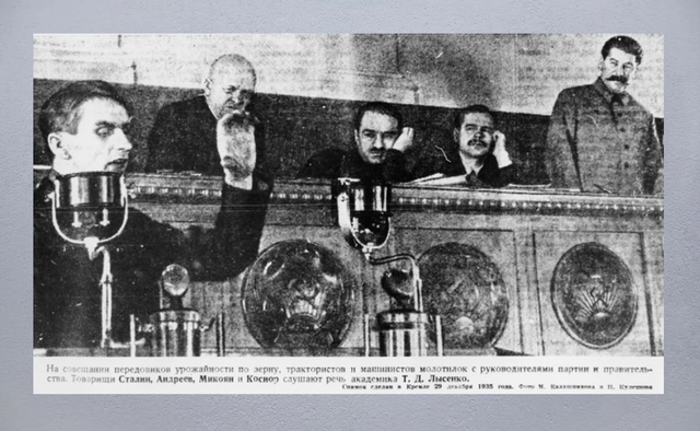 1935: Lysenko delivers a lecture at Kremlin under the benevolent gaze of Stalin. 
